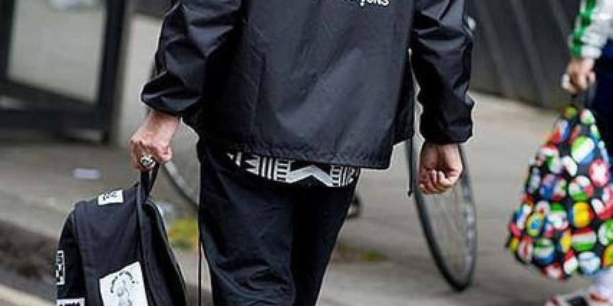 Historical Influence of Comme des Garçons on Fashion Industry Development